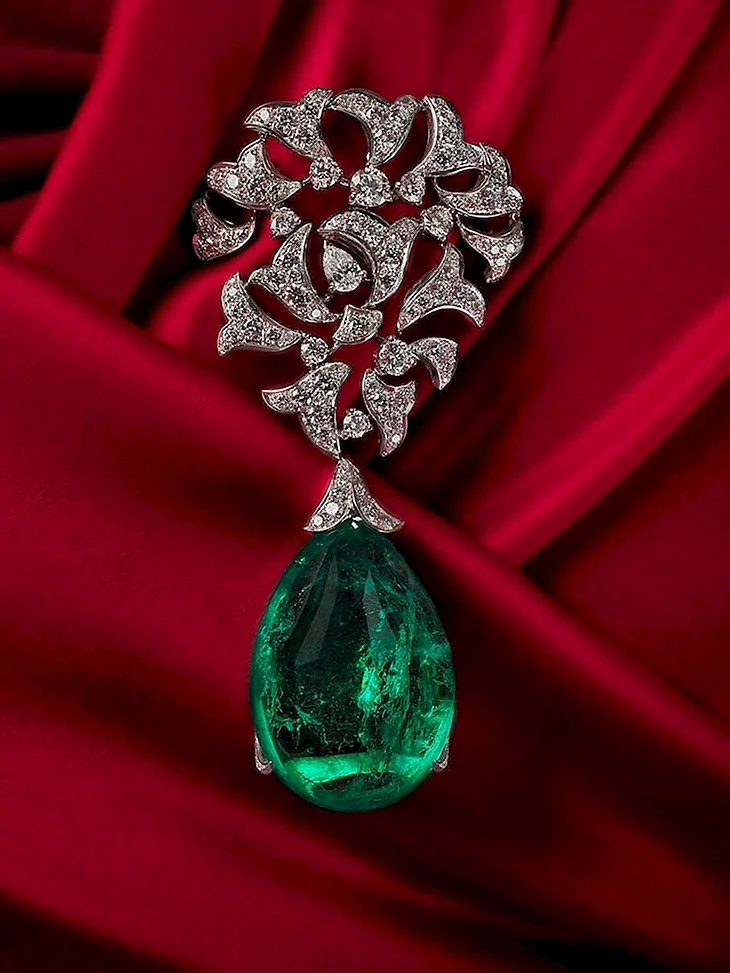 Cartier брошь Моголов изумруд